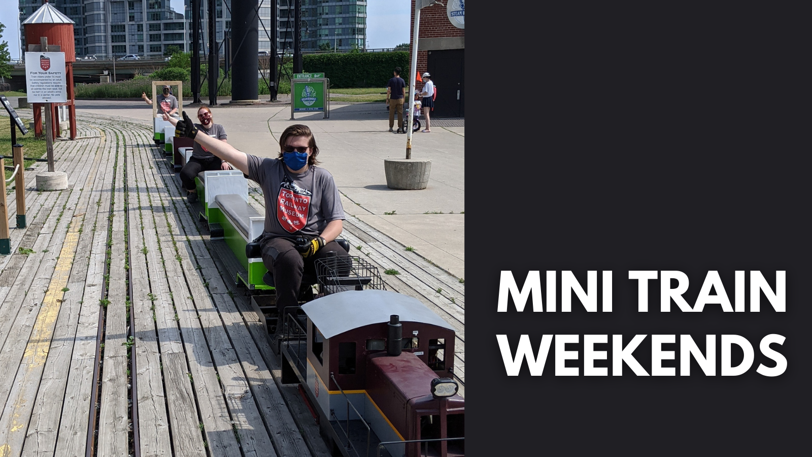 Musuem staff members prepare the miniature train for the mini train weekends this summer